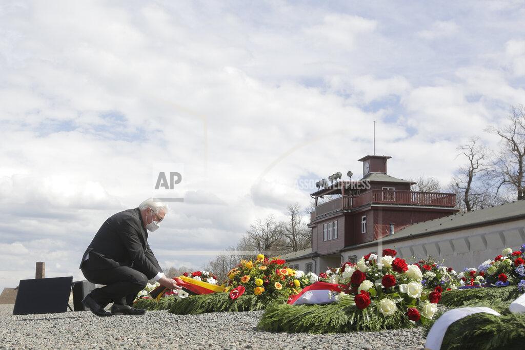 Markus Schreiber German President Frank-Walter Steinmeier lays down a wreath during commemorations marking the 76th anniversary of the liberation of the Nazi concentration camp Buchenwald near Weimar, Germany, Sunday, April 11, 2021. On April 11, 1945 the US Army liberated the concentration camp Buchenwald. (AP Photo/Markus Schreiber)