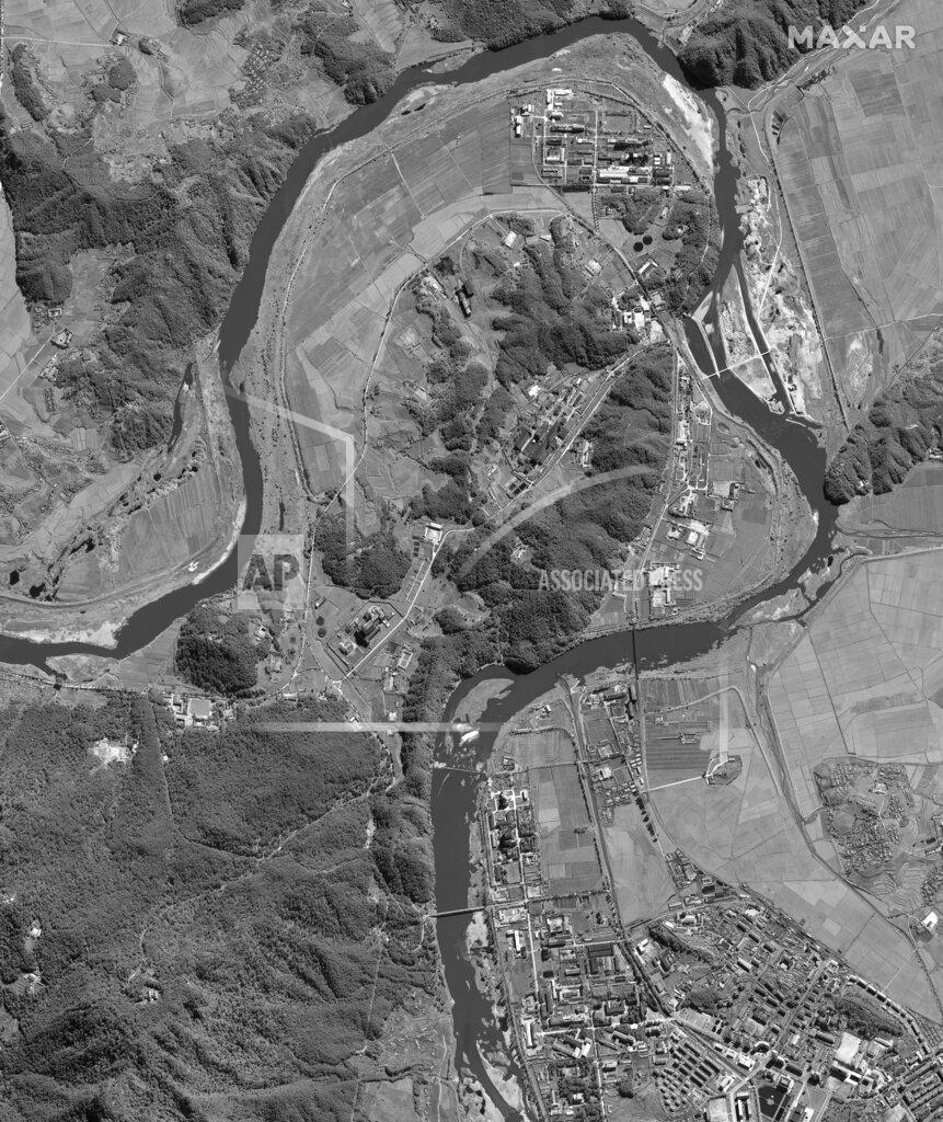 Uncredited This Aug. 14, 2021, satellite image provided by Maxar Technologies shows an overview of North Korea's Yongbyon nuclear complex, upper center right. Recent satellite images show North Korea is expanding a uranium enrichment plant at the nuclear complex, a sign that it's intent on boosting the production of bomb materials, experts say. The assessment comes after North Korea recently raised tensions with its first missile tests in six months amid long-dormant nuclear disarmament negotiations with the United States. (Satellite image ©2021 Maxar Technologies via AP)