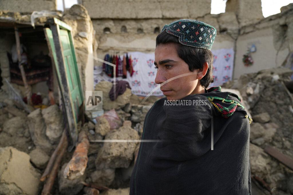 Ebrahim Noroozi A man stands among destruction after an earthquake in Gayan village, in Paktika province, Afghanistan, Thursday, June 23, 2022. A powerful earthquake struck a rugged, mountainous region of eastern Afghanistan early Wednesday, flattening stone and mud-brick homes in the country's deadliest quake in two decades, the state-run news agency reported. (AP Photo/Ebrahim Nooroozi)