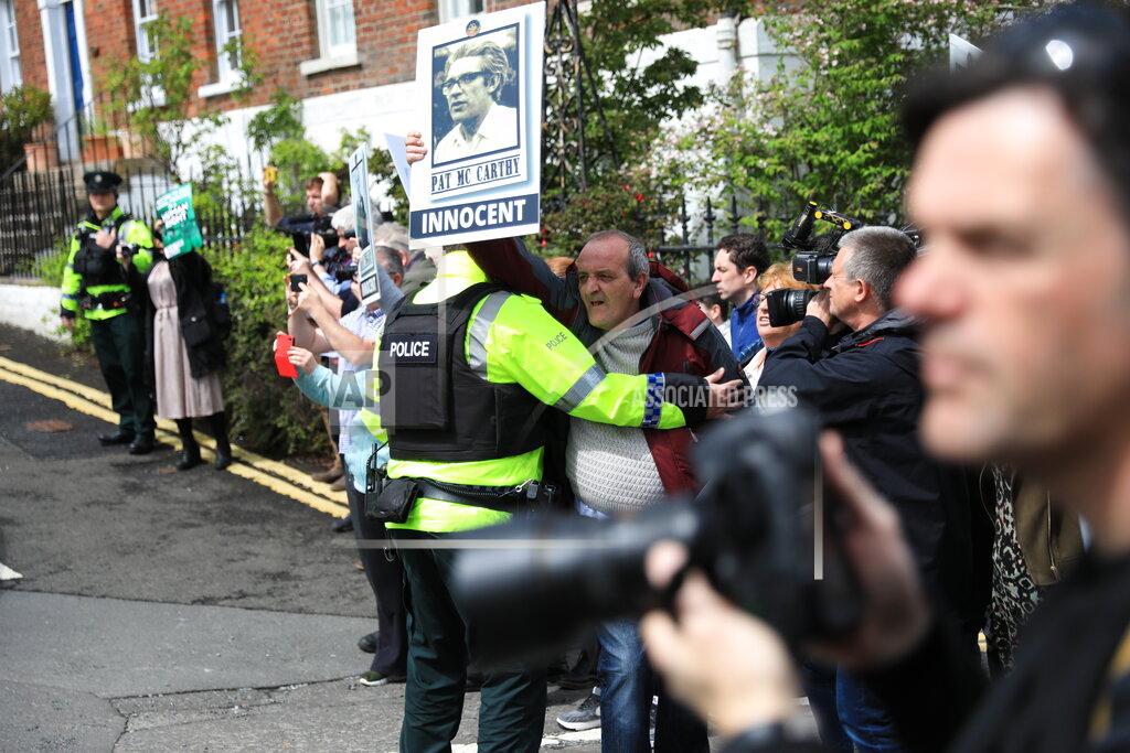 Peter Morrison Border Communities Against Brexit protest outside Hillsborough Castle, Northern Ireland, Monday, May, 16, 2022. British Prime Minister Johnson said there would be “a necessity to act” if the EU doesn't agree to overhaul post-Brexit trade rules that he says are destabilizing Northern Ireland's delicate political balance. Johnson was holding private talks with the leaders of Northern Ireland's main political parties, urging them to get back to work. (AP Photo/Peter Morrison)