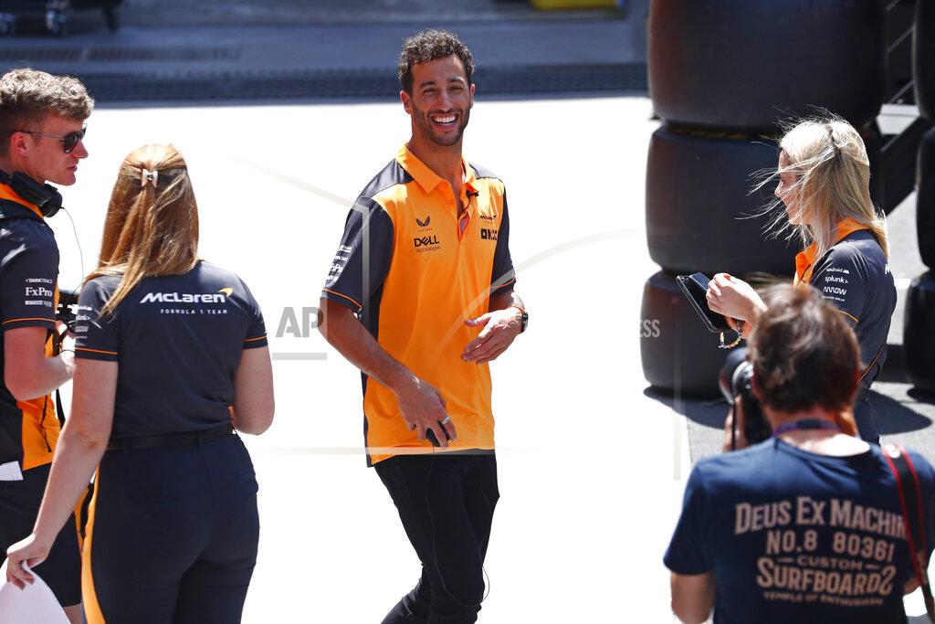 Joan Monfort McLaren driver Daniel Ricciardo of Australia talks with team staff ahead of Sunday's Spanish Formula One Grand Prix at the Barcelona-Catalunya racetrack in Montmelo, just outside Barcelona, Spain, Thursday, May 19, 2022. (AP Photo/Joan Monfort)
