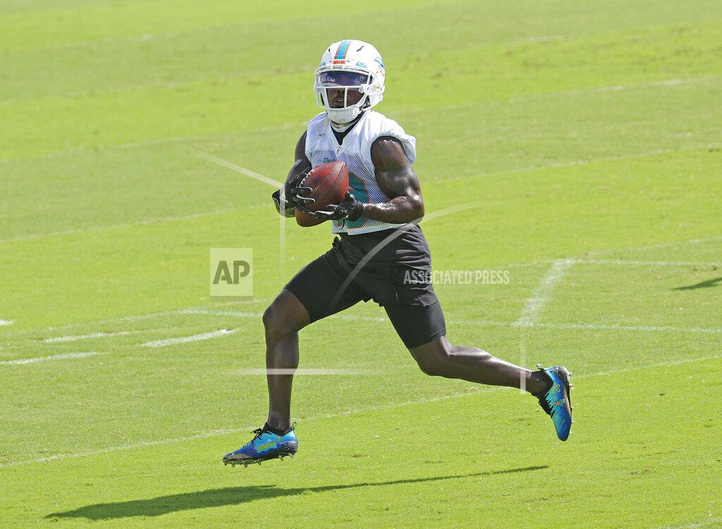 Joel Auerbach Miami Dolphins wide receiver Jakeem Grant (19) catches the ball during NFL football practice in Davie, Fla., Friday, Sept. 11, 2020. (AP Photo/Joel Auerbach)