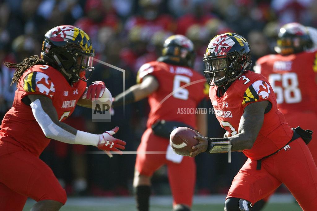 Nick Wass Maryland quarterback Tyrrell Pigrome (3) hands the ball off to Maryland running back Anthony McFarland (5) during the first half of an NCAA football game against Ohio State, Saturday, Nov. 17, 2018, in College Park, Md. (AP Photo/Nick Wass)