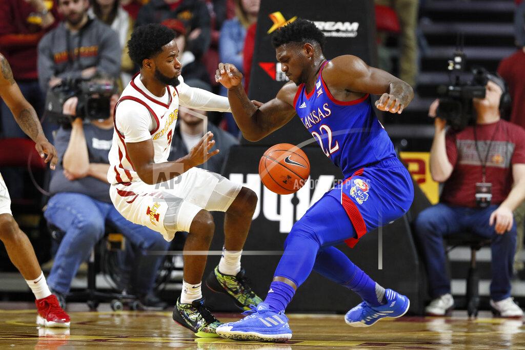 Charlie Neibergall Iowa State guard Tre Jackson, left, fights for a loose ball with Kansas forward Silvio De Sousa during the second half of an NCAA college basketball game, Wednesday, Jan. 8, 2020, in Ames, Iowa. Kansas won 79-53. (AP Photo/Charlie Neibergall)