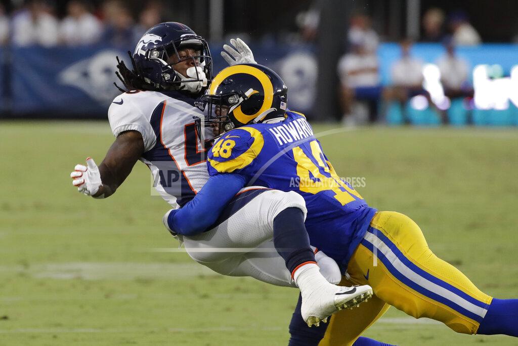 FILE - In this Aug. 24, 2019, file photo, Los Angeles Rams linebacker Travin Howard (48) during an NFL preseason football game against the Denver Broncos in Los Angeles. Howard and rookie Dakota Allen are competing for backup jobs and the final roster spots with the defending NFC champions this week in their preseason finale. (AP Photo/Rick Scuteri,File)
