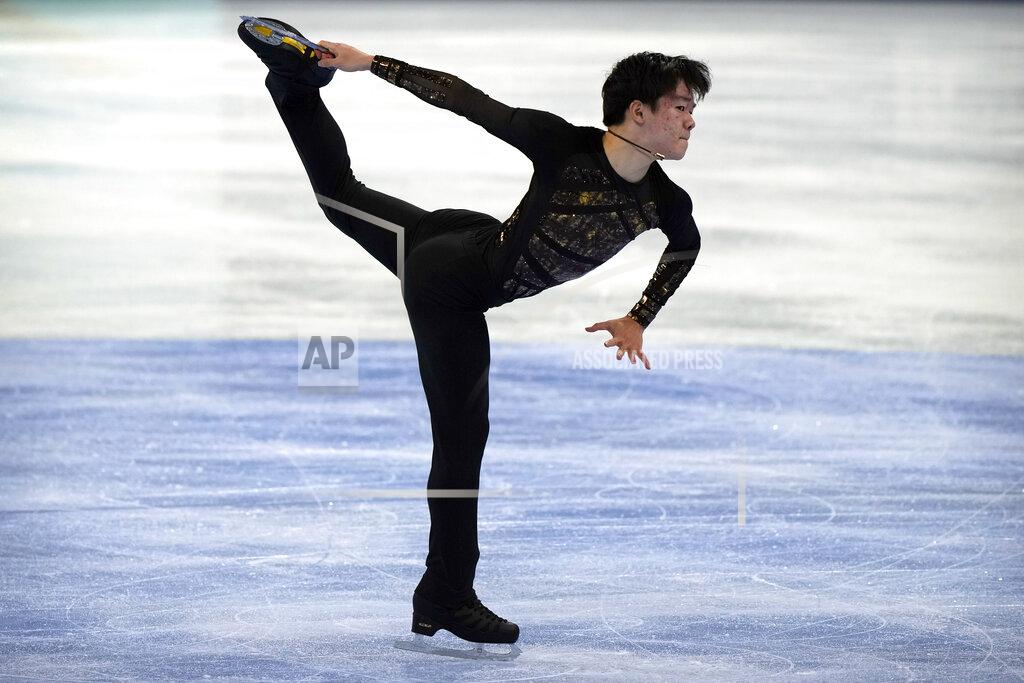 Mark Schiefelbein Yuma Kagiyama of Japan performs in the men's free skating competition at the Asian Open Figure Skating Trophy, a test event for the 2022 Winter Olympics, at the Capital Indoor Stadium in Beijing, Friday, Oct. 15, 2021. (AP Photo/Mark Schiefelbein)