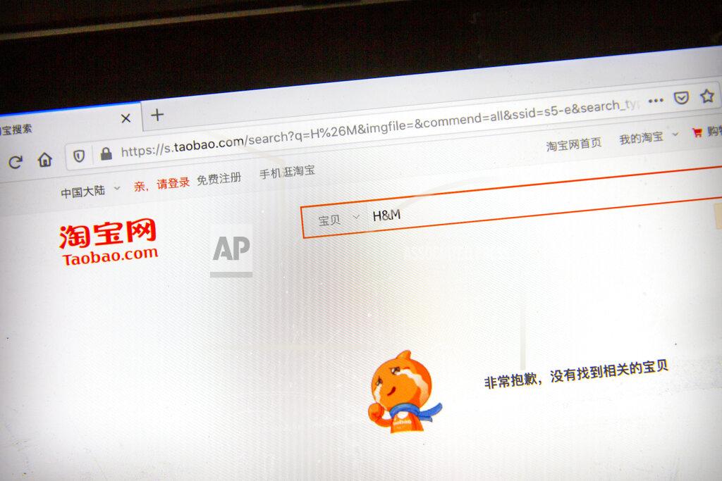Mark Schiefelbein The Chinese e-commerce site Taobao displays the message "Sorry, no related items were found" when searching for products from clothing retailer H&M, as seen on a computer screen in Beijing, Friday, March 26, 2021. H&M disappeared from the internet in China as the government raised pressure on shoe and clothing brands and announced sanctions Friday against British officials in a spiraling fight over complaints of abuses in the Xinjiang region.(AP Photo/Mark Schiefelbein)