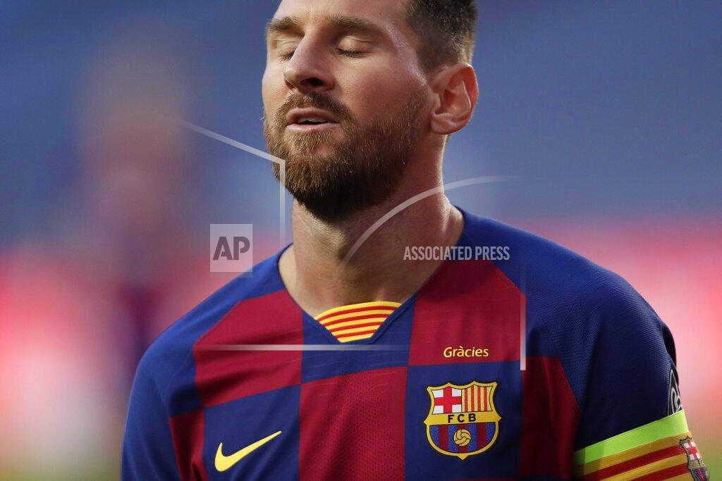 Manu Fernandez Barcelona's Lionel Messi reacts during the Champions League quarterfinal match between FC Barcelona and Bayern Munich at the Luz stadium in Lisbon, Portugal, Friday, Aug. 14, 2020. Gerard Piqué says Barcelona "hit rock bottom" in an 8-2 humiliation from Bayern Munich in the Champions League quarterfinals. It's 74 years since Barcelona conceded eight goals in a game. (AP Photo/Manu Fernandez/Pool)