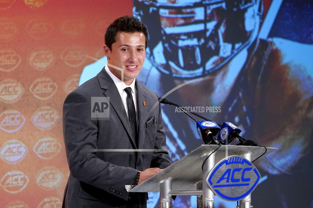 Chuck Burton Syracuse's Tommy DeVito speaks during the Atlantic Coast Conference NCAA college football media day in Charlotte, N.C., Wednesday, July 17, 2019. (AP Photo/Chuck Burton)