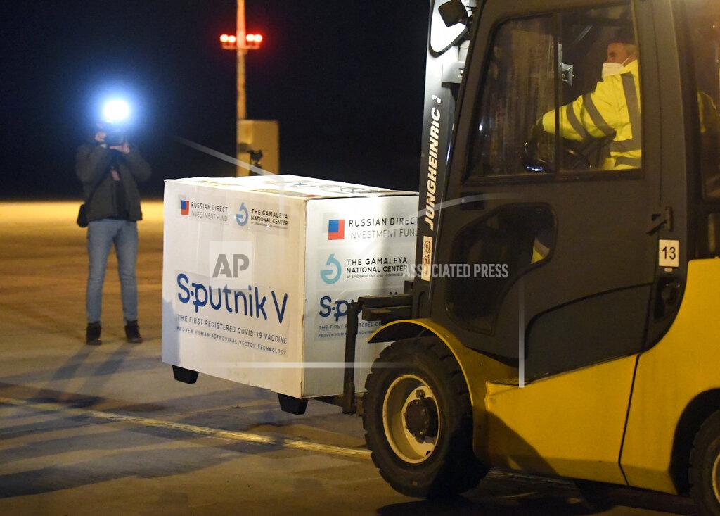 FILE - In this March 1, 2021, file photo, Russia's Sputnik V coronavirus vaccine arrives at Kosice Airport, Slovakia. Russia’s boast in August that it was the first country to authorize a coronavirus vaccine led to skepticism because of its insufficient testing on only a few dozen people. Now, with demand growing for the Sputnik V, experts are raising questions again, this time over whether Moscow can keep up with all the orders from countries that want it. (Frantisek Ivan/TASR via AP, File)