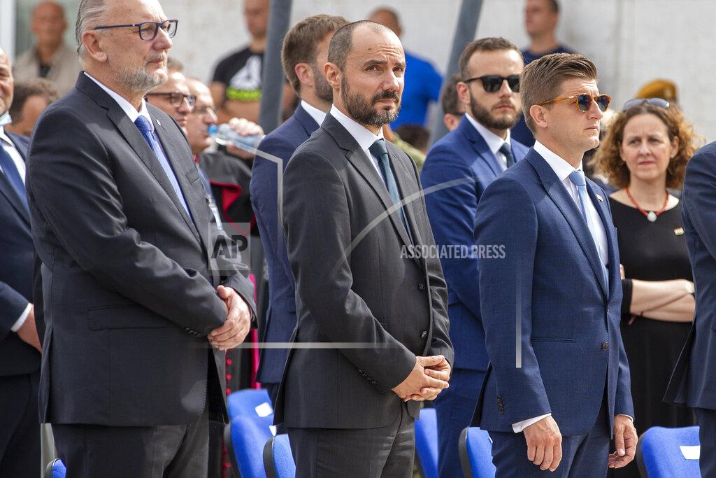 Darko Bandic Croatia's Deputy Prime Minister Boris Milosevic attends a ceremony in Knin, Croatia, Wednesday, Aug. 5, 2020. Croatia marked the 25th anniversary of a victorious wartime military offensive, with an ethnic Serb politician attending the ceremony for the first time in what is seen as an important step toward reconciliation. (AP Photo/Darko Bandic)