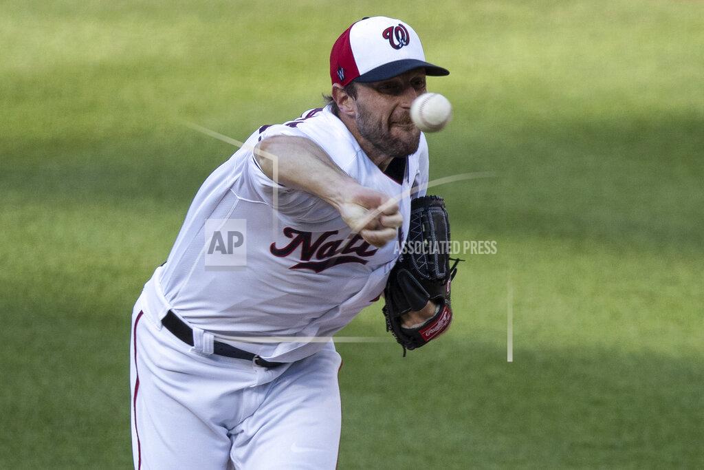 Alex Brandon Washington Nationals starting pitcher Max Scherzer throws during the first inning of an exhibition baseball game against the Philadelphia Phillies at Nationals Park, Saturday, July 18, 2020, in Washington. (AP Photo/Alex Brandon)