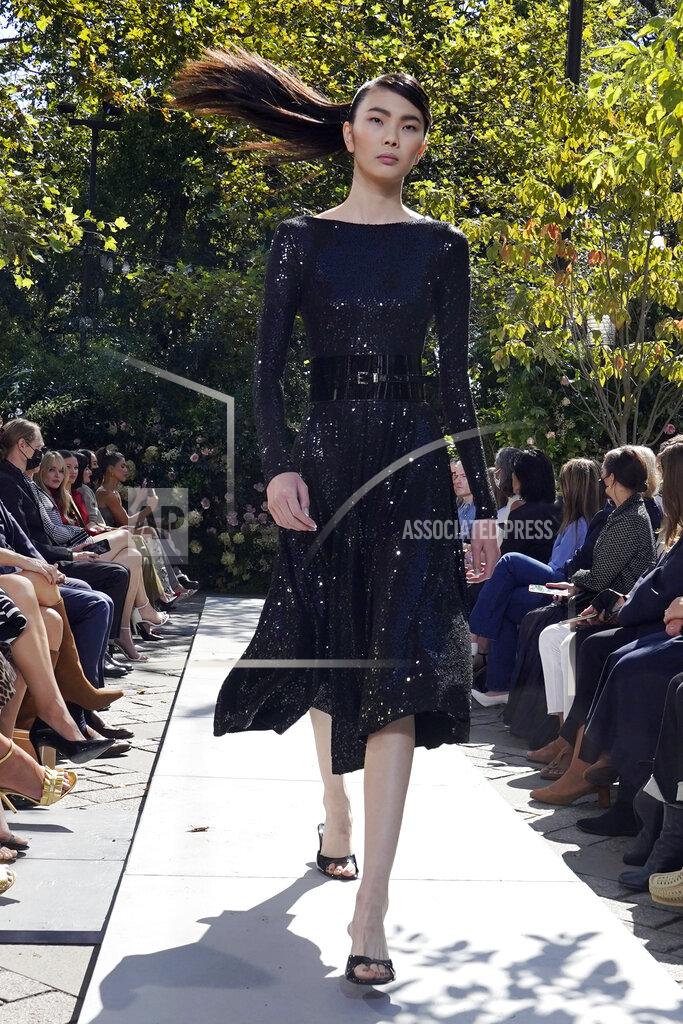 Richard Drew The Michael Kors Spring/Summer 2022 collection is modeled during Fashion Week in New York, Friday, Sept. 10, 2021. (AP Photo/Richard Drew)