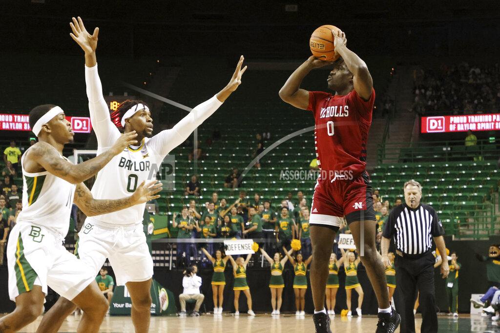 Rod Aydelotte Nicholls State guard Ty Gordon sets up a three-point shot over Baylor forward Flo Thamba (0) in the first half of an NCAA college basketball game, Monday, Nov. 15, 2021, in Waco, Texas. (AP Photo/Rod Aydelotte)