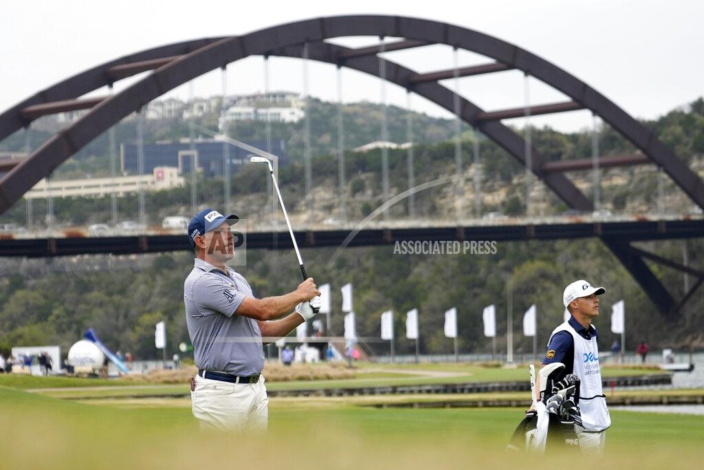 David J. Phillip Lee Westwood, of England, hits his second shot on the 13th hole during a first round match at the Dell Technologies Match Play Championship golf tournament Wednesday, March 24, 2021, in Austin, Texas. (AP Photo/David J. Phillip)