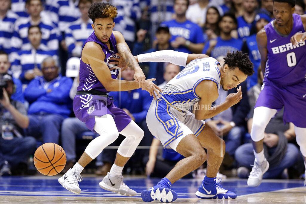 Gerry Broome Central Arkansas guard DeAndre Jones, left, and Duke guard Tre Jones (3) chase the ball during the half of an NCAA college basketball game in Durham, N.C., Tuesday, Nov. 12, 2019. (AP Photo/Gerry Broome)