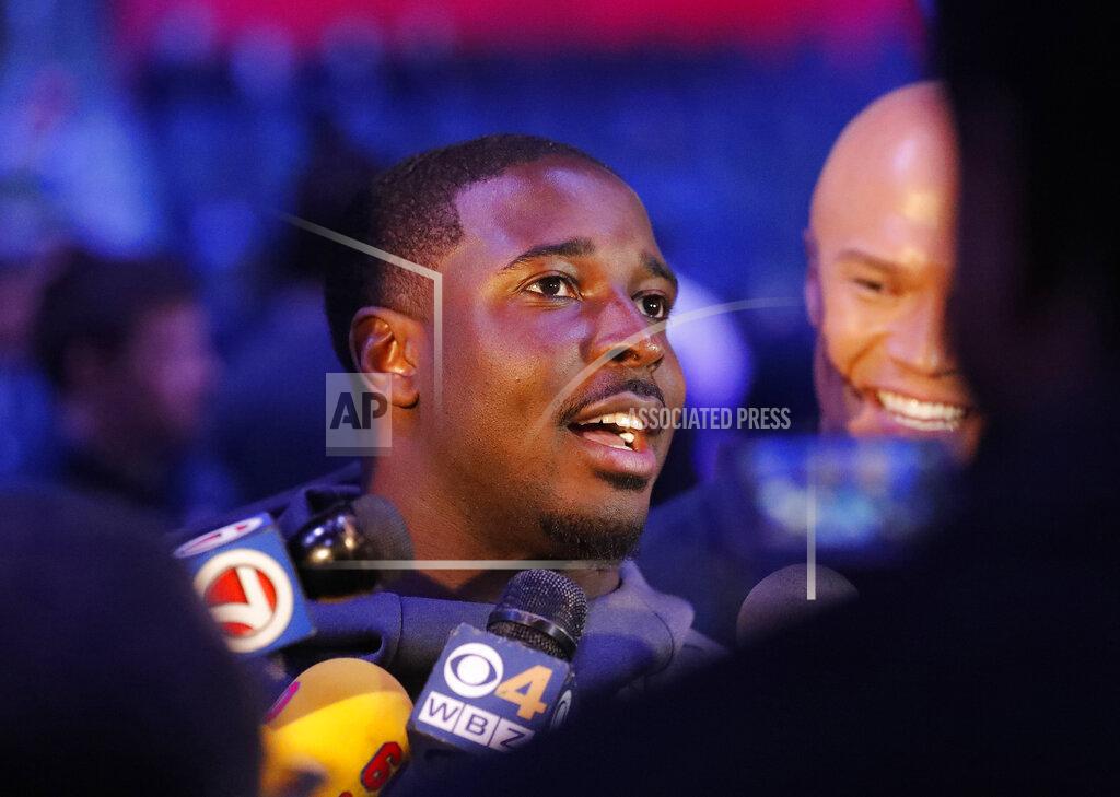 John Bazemore New England Patriots' Sony Michel answers a question during Opening Night for the NFL Super Bowl 53 football game Monday, Jan. 28, 2019, in Atlanta. (AP Photo/John Bazemore)