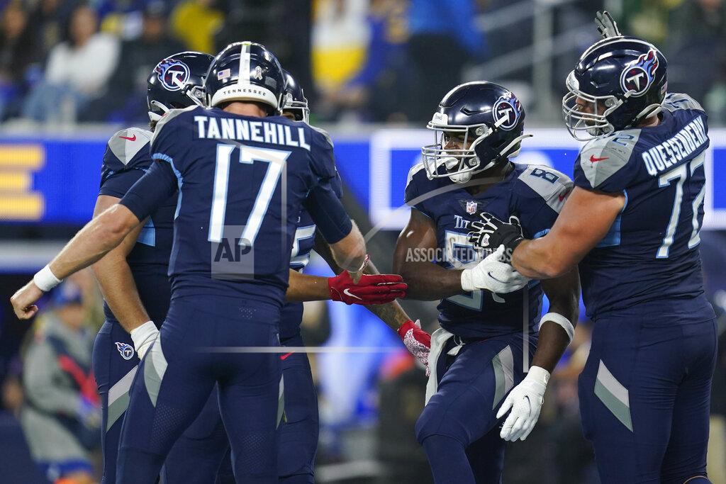 Ashley Landis Tennessee Titans running back Adrian Peterson, second from right, celebrates with teammates quarterback Ryan Tannehill (17), offensive tackle David Quessenberry, right, and others after scoring a touchdown during the second half of an NFL football game against the Los Angeles Rams, Sunday, Nov. 7, 2021, in Inglewood, Calif. (AP Photo/Ashley Landis)