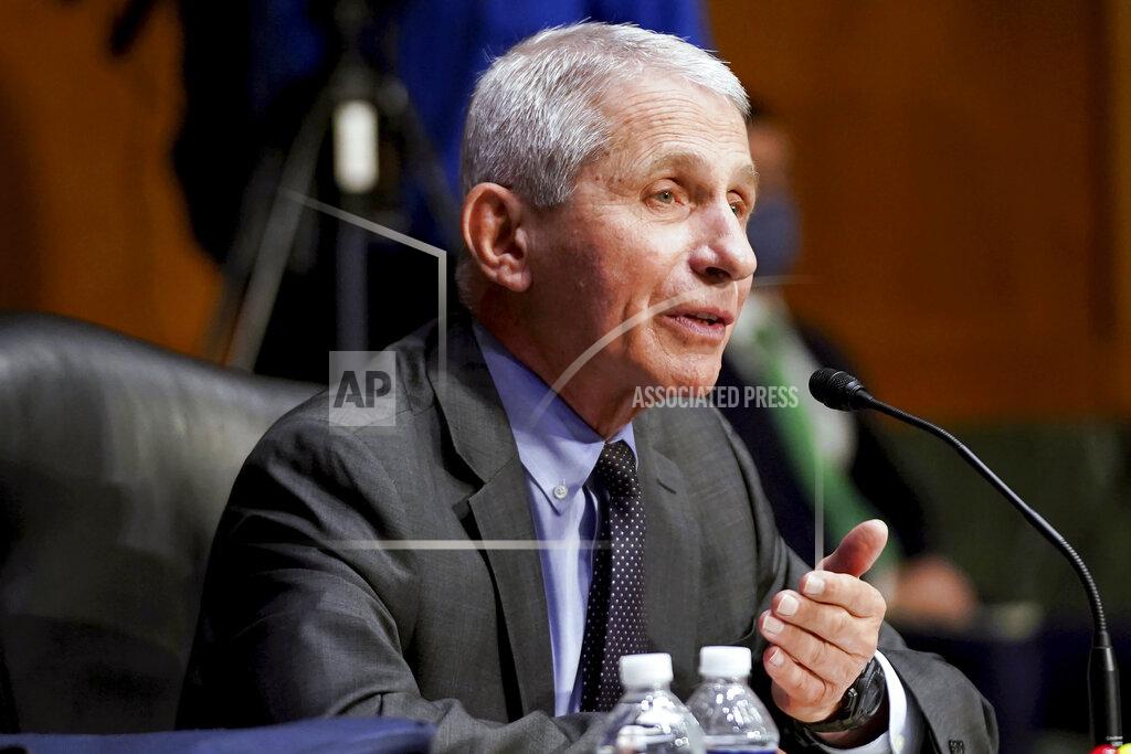 Jim Lo Scalzo Dr. Anthony Fauci, director of the National Institute of Allergy and Infectious Diseases, testifies during a Senate Health, Education, Labor, and Pensions hearing to examine an update from Federal officials on efforts to combat COVID-19, Tuesday, May 11, 2021 on Capitol Hill in Washington. Fauci says whether vaccinated Americans will need a booster shot may depend on possible variants during an interview on CBS “This Morning” Friday, May 21. (Jim Lo Scalzo/Pool via AP)