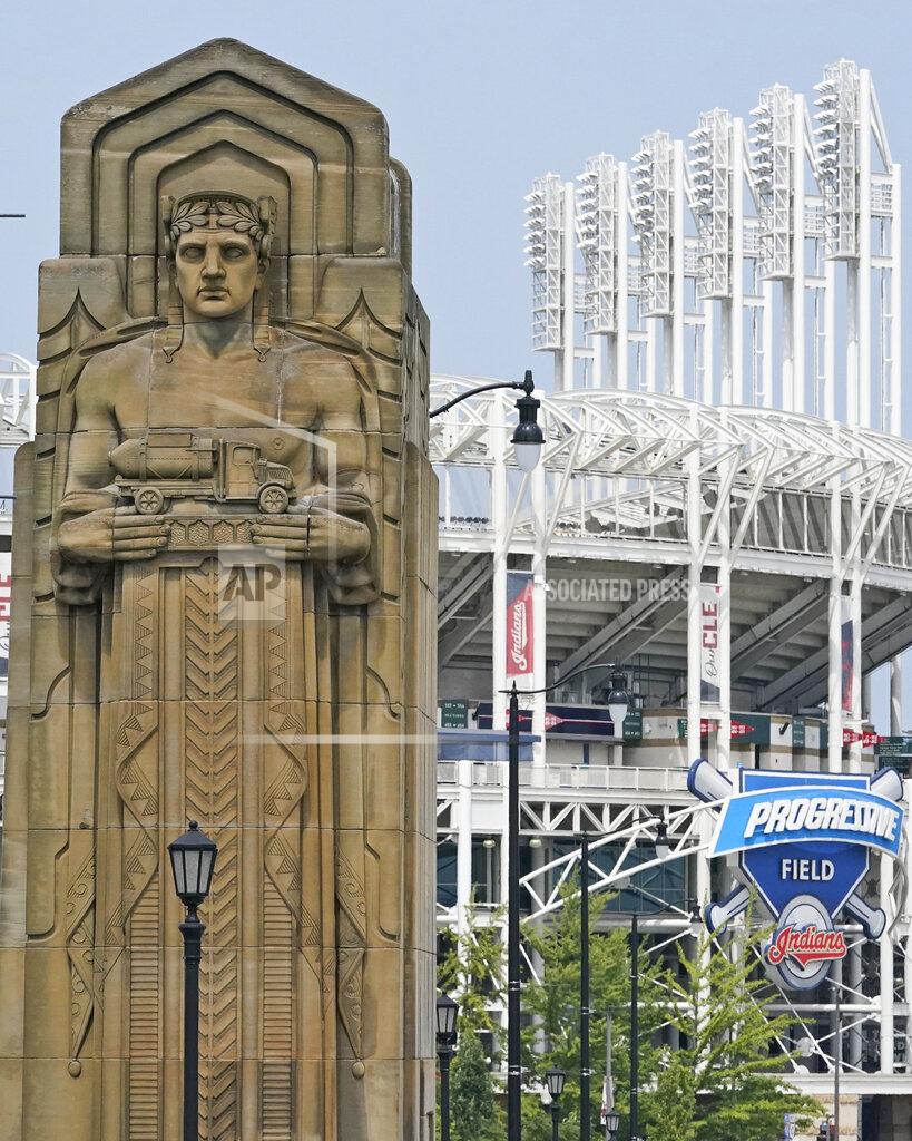 Tony Dejak A guardian rests on the Hope Memorial Bridge within site of Progressive Field, Friday, July 23, 2021, in Cleveland. Cleveland's new name was inspired by two large landmark stone edifices near the downtown ballpark, referred to as traffic guardians, on the Hope Memorial Bridge over the Cuyahoga River. The team's colors will remain the same, and the new Guardians' new logos will incorporate some of the architectural features of the bridge. (AP Photo/Tony Dejak)