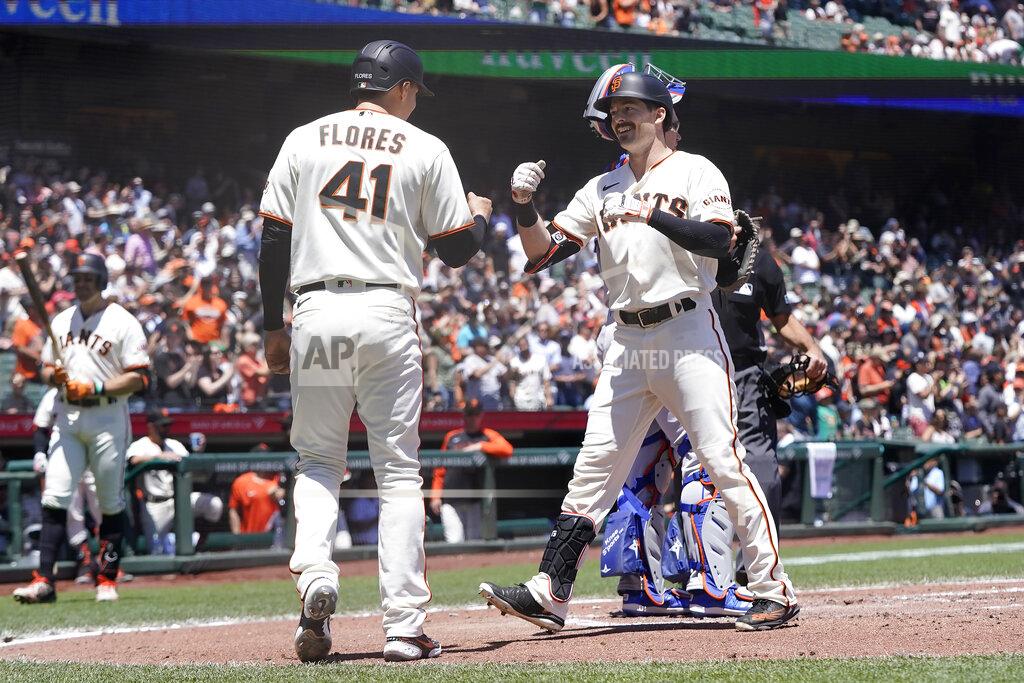 Jeff Chiu San Francisco Giants' Mike Yastrzemski, right, celebrates after hitting a two-run home run that scored Wilmer Flores (41) during the second inning of a baseball game against the New York Mets in San Francisco, Wednesday, May 25, 2022. (AP Photo/Jeff Chiu)