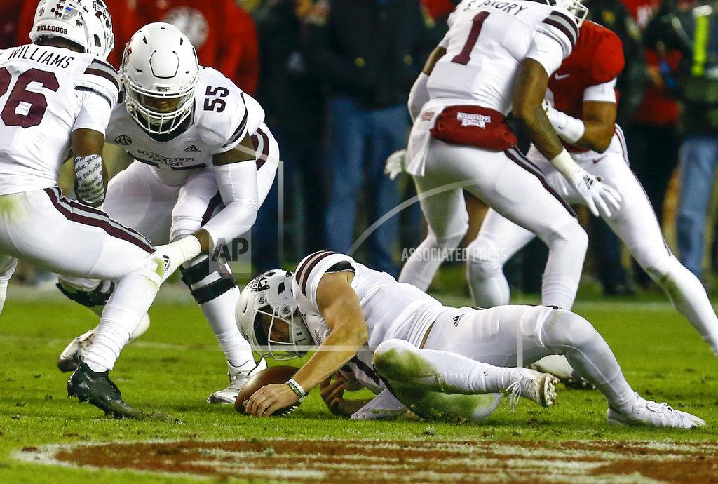Butch Dill Mississippi State quarterback Nick Fitzgerald (7) dives on a fumbled snap during the second half of an NCAA college football game against Alabama, Saturday, Nov. 10, 2018, in Tuscaloosa, Ala. (AP Photo/Butch Dill)