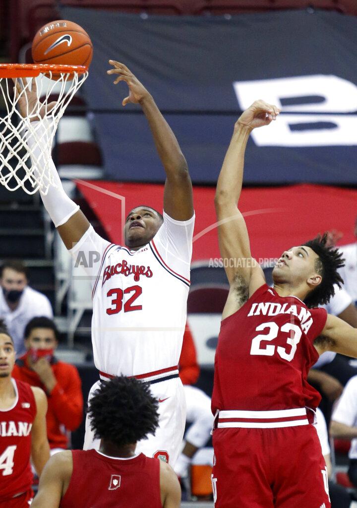Paul Vernon Ohio State forward E.J. Liddell, left, reaches for a rebound against Indiana forward Trayce Jackson-Davis during the second half of an NCAA college basketball game in Columbus, Ohio, Saturday, Feb. 13, 2021. Ohio State won 78-59. (AP Photo/Paul Vernon)