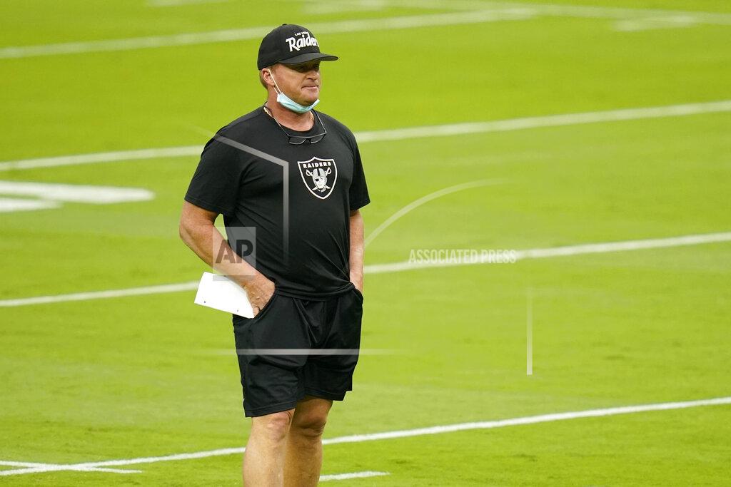 John Locher Las Vegas Raiders head coach Jon Gruden watches during an NFL football training camp practice Friday, Aug. 28, 2020, in Las Vegas. (AP Photo/John Locher)