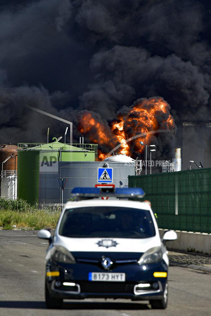 Alvaro Barrientos Black smoke billows from a biodiesel production plant in Calahorra, northern Spain, Thursday, May 26, 2022. Police in Spain say an explosion at a biodiesel plant has left two people dead and forced 250 children to be evacuated from the area. (AP Photo/Alvaro Barrientos)