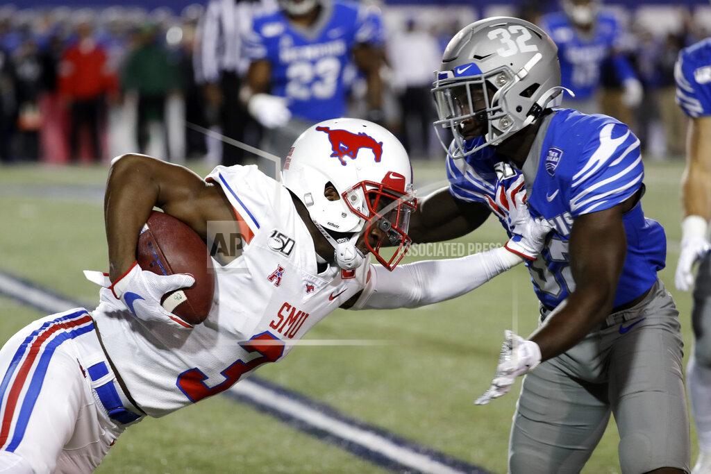 Mark Humphrey SMU wide receiver James Proche (3) carries the ball against Memphis defensive back Jacobi Francis (32) in the first half of an NCAA college football game Saturday, Nov. 2, 2019, in Memphis, Tenn. (AP Photo/Mark Humphrey)