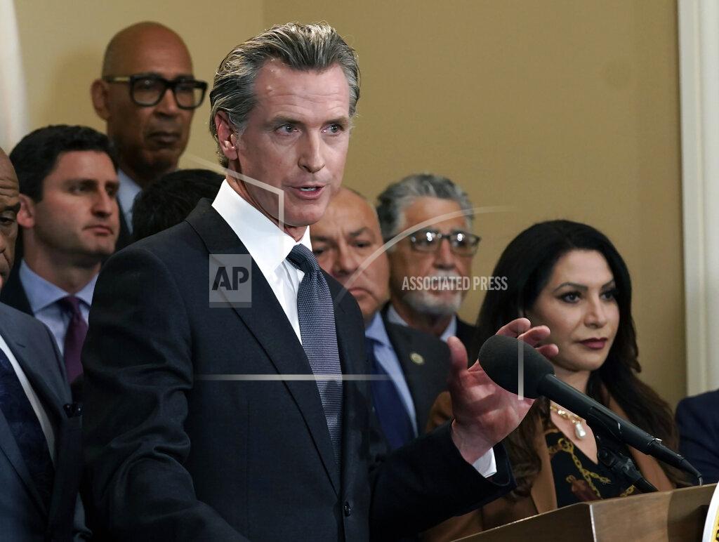 Rich Pedroncelli California Gov. Gavin Newsom discusses the recent mass shooting in Texas, during a news conference in Sacramento, Calif., Wednesday, May 25, 2022. Flanked by lawmakers from both houses of the state legislature, Newsom said he is ready to sign more restrictive gun measures passed by lawmakers.(AP Photo/Rich Pedroncelli)