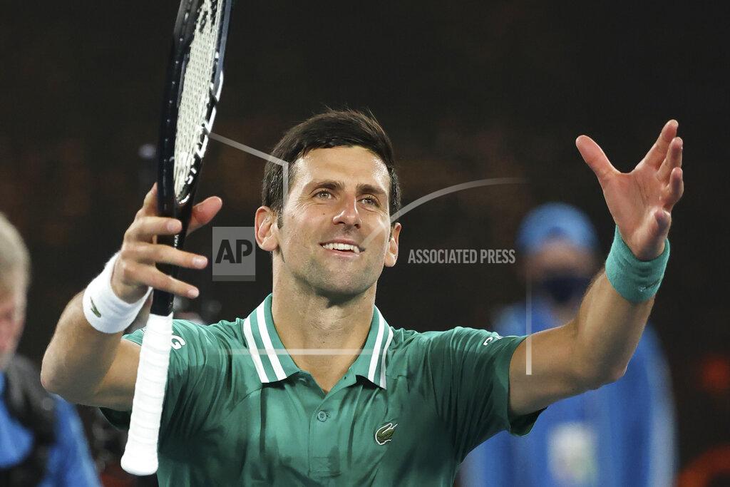Hamish Blair Serbia's Novak Djokovic celebrates after defeating France's Jeremy Chardy during their first round match at the Australian Open tennis championship in Melbourne, Australia, Monday, Feb. 8, 2021. (AP Photo/Hamish Blair)