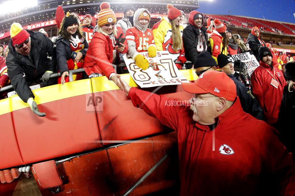 Charlie Riedel Kansas City Chiefs head coach Andy Reid celebrates with fans after the NFL AFC Championship football game against the Tennessee Titans Sunday, Jan. 19, 2020, in Kansas City, MO. The Chiefs won 35-24 to advance to Super Bowl 54. (AP Photo/Charlie Riedel)