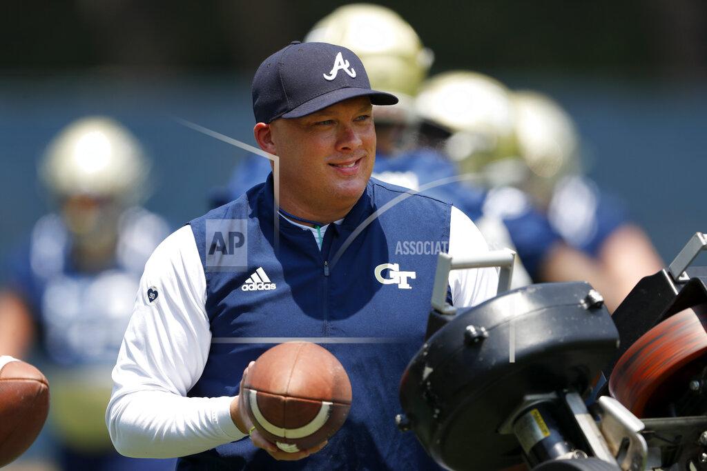 John Bazemore Georgia Tech head coach Geoff Collins works with his kick returners during the team's first preseason NCAA college football practice Wednesday, July 31, 2019, in Atlanta. From his love of Waffle House to the embracing of social media, the first-year coach has seemingly been everywhere since his hiring by the Yellow Jackets. Now, the reality: he's trying to install a new offense with the opener against reigning national champion Clemson about a month away.(AP Photo/John Bazemore)