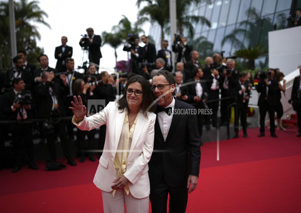 Daniel Cole Tricia Cooke, left, and Ethan Coen pose for photographers upon arrival at the premiere of the film 'Forever Young' at the 75th international film festival, Cannes, southern France, Sunday, May 22, 2022. (AP Photo/Daniel Cole)