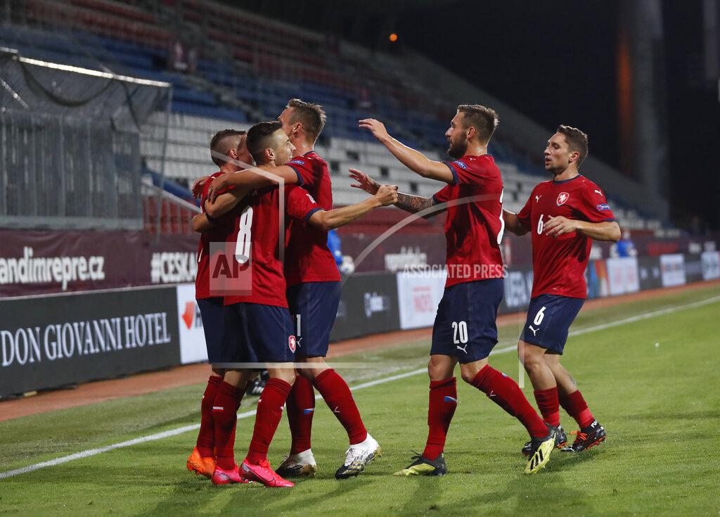 Petr David Josek Czech Republic's Jakub Pesek, left no 8, celebrates with teammates after scoring against Scotland, during the UEFA Nations League soccer match between Czech Republic and Scotland in Olomouc, Czech Republic, Monday, Sept. 7, 2020. (AP Photo/Petr David Josek)
