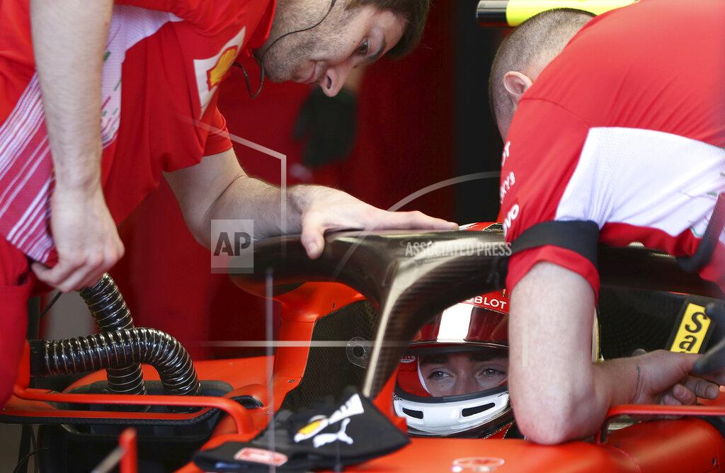 Rick Rycroft Ferrari driver Charles Leclerc of Monaco, bottom, prepares for the final practice session for the Australian Grand Prix in Melbourne, Australia, Saturday, March 16, 2019. The first race of the year is Sunday. (AP Photo/Rick Rycroft)