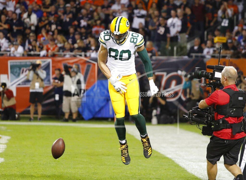 Charles Rex Arbogast Green Bay Packers' Jimmy Graham reacts after catching a touchdown pass during the first half of an NFL football game against the Chicago Bears Thursday, Sept. 5, 2019, in Chicago. (AP Photo/Charles Rex Arbogast)