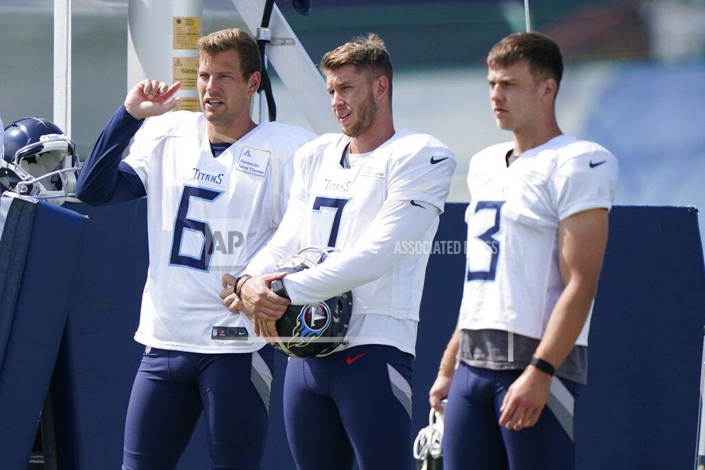FILE - Tennessee Titans punter Brett Kern (6) talks with place kickers Greg Joseph (7) and Tucker McCann (3) during NFL football training camp Tuesday, Aug. 18, 2020, in Nashville, Tenn. The Tennessee Titans have made a switch at kicker agreeing to terms with veteran Stephen Gostkowski and waiving Greg Joseph. The Titans announced the move Thursday morning, Sept. 3, 2020. (AP Photo/Mark Humphrey, FIle)