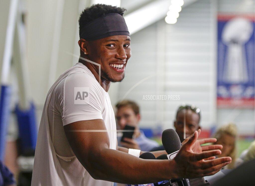 New York Giants running back Saquon Barkley speaks during a news conference after practice with teammates at the NFL football team's training camp in Thursday, July 25, 2019, in East Rutherford, N.J. (AP Photo/Frank Franklin II)