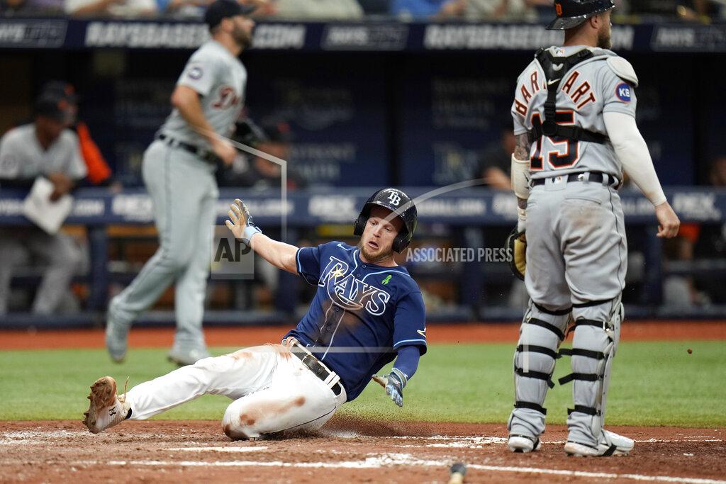 Chris O'MEara Tampa Bay Rays' Brett Phillips scores behind Detroit Tigers catcher Tucker Barnhart on an RBI single by Ji-Man Choi during the seventh inning of a baseball game Wednesday, May 18, 2022, in St. Petersburg, Fla. (AP Photo/Chris O'Meara)