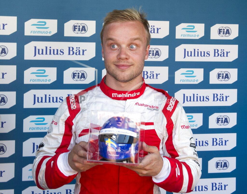 Ryan Remiorz File-This July 30, 2017, file photo shows Felix Rosenqvist of Sweden, with Team Mahindra, holding his trophy for winning the pole position at the Montreal Formula ePrix electric car race in Montreal. After their early years racing each other in karts, Sweden’s Marcus Ericsson and Rosenqvist took very different paths chasing checkered flags around the globe before finally landing in the U.S. Now they represent a “Swedish Invasion” of IndyCar as two series rookies with vast experience and big expectations heading into the 2019 season. (Ryan Remiorz/The Canadian Press via AP, File)