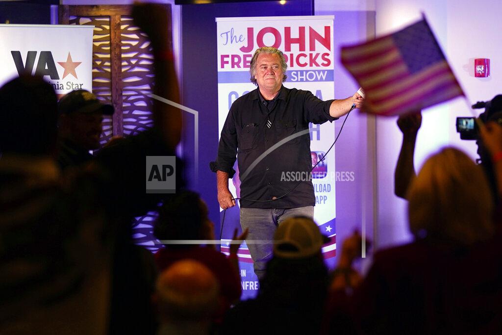 Steve Helber Political strategist Steve Bannon gestures during a speech during an election rally in Richmond, Va., Wednesday, Oct. 13, 2021. Conservative radio host John Fredericks, a former Trump campaign chairman in Virginia, organized the "Take Back Virginia Rally" in which former President Donald Trump called in. (AP Photo/Steve Helber)