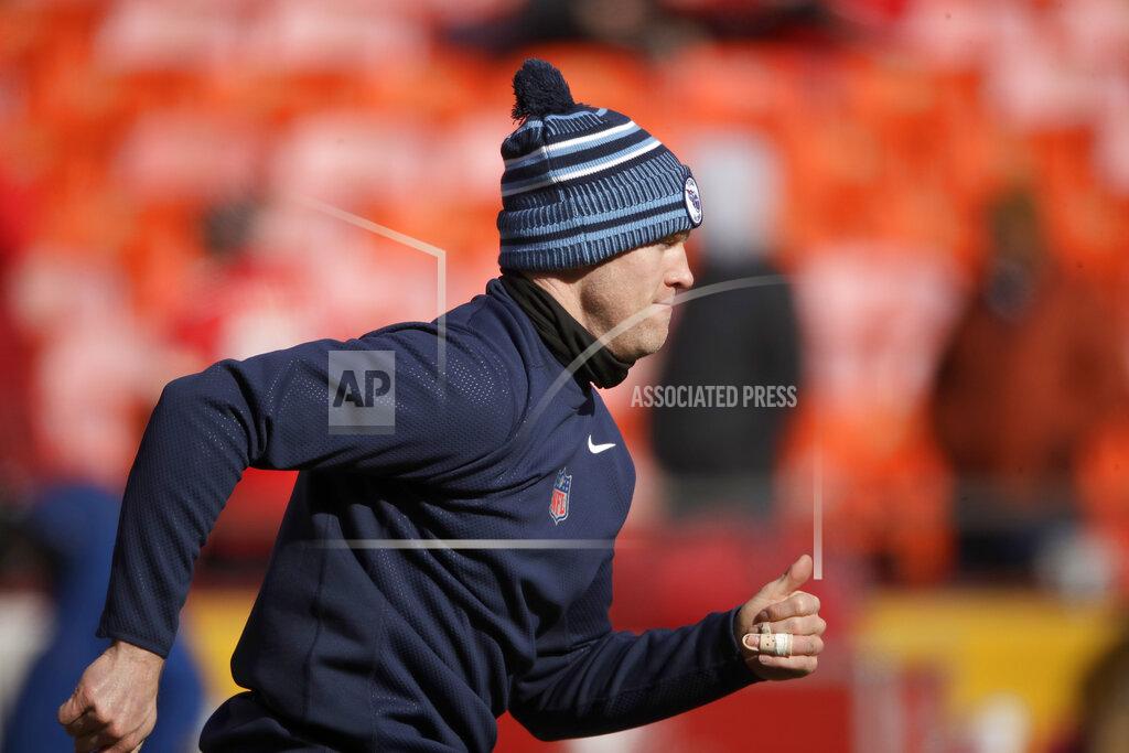 Charlie Riedel Tennessee Titans quarterback Ryan Tannehill warms up before the NFL AFC Championship football game against the Kansas City Chiefs Sunday, Jan. 19, 2020, in Kansas City, MO. (AP Photo/Charlie Riedel)