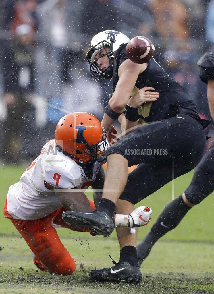 Darron Cummings Purdue quarterback Jack Plummer (13) fumbles after getting hit by Illinois linebacker Dele Harding (9) during the second half of an NCAA college football game, Saturday, Oct. 26, 2019, in West Lafayette, Ind. (AP Photo/Darron Cummings)