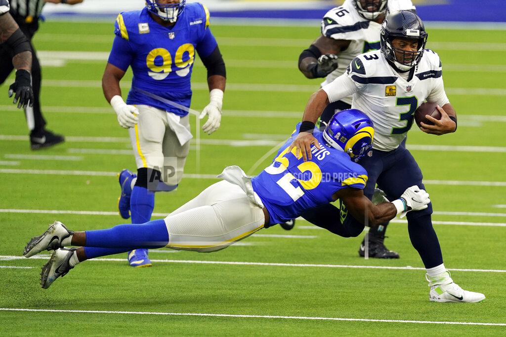 Ashley Landis Seattle Seahawks quarterback Russell Wilson (3) is tackled by Los Angeles Rams linebacker Terrell Lewis (52) during the second half of an NFL football game Sunday, Nov. 15, 2020, in Inglewood, Calif. (AP Photo/Ashley Landis)