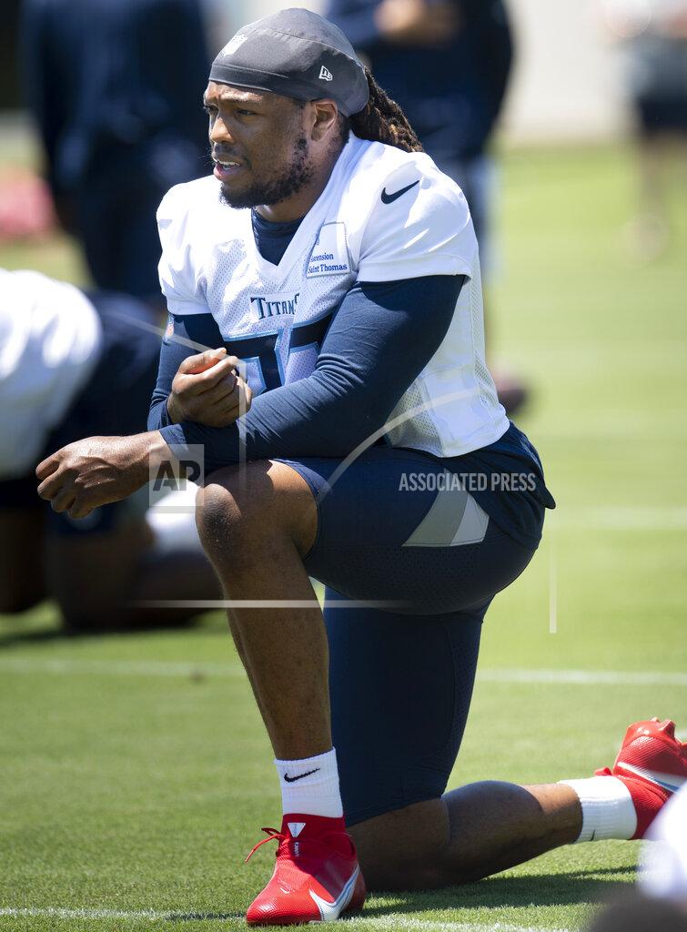 George Walker Iv Tennessee Titans running back Derrick Henry stretches during an NFL football minicamp practice Tuesday, June 15, 2021, in Nashville, Tenn. (George Walker IV/The Tennessean via AP, Pool)