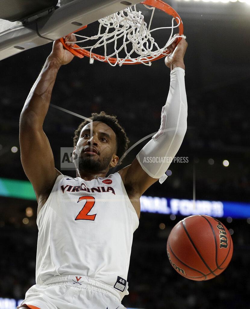 David J. Phillip Virginia's Braxton Key (2) dunks during the overtime in the championship of the Final Four NCAA college basketball tournament against Texas Tech, Monday, April 8, 2019, in Minneapolis. (AP Photo/David J. Phillip)