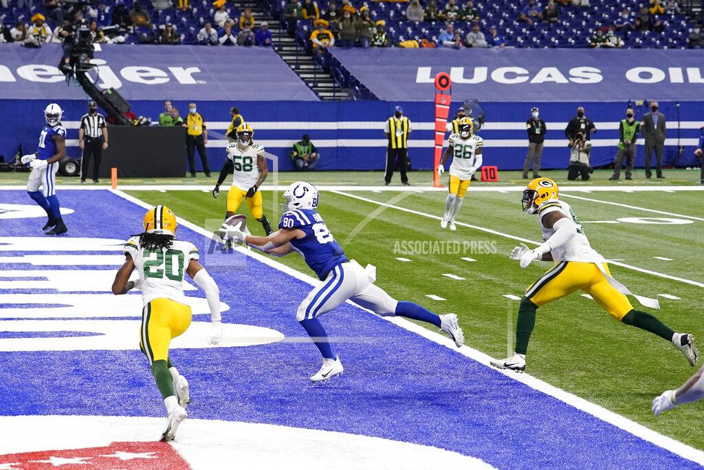 Michael Conroy Indianapolis Colts tight end Trey Burton (80) makes a touchdown catch during the first half of an NFL football game against the Green Bay Packers, Sunday, Nov. 22, 2020, in Indianapolis. (AP Photo/Michael Conroy)