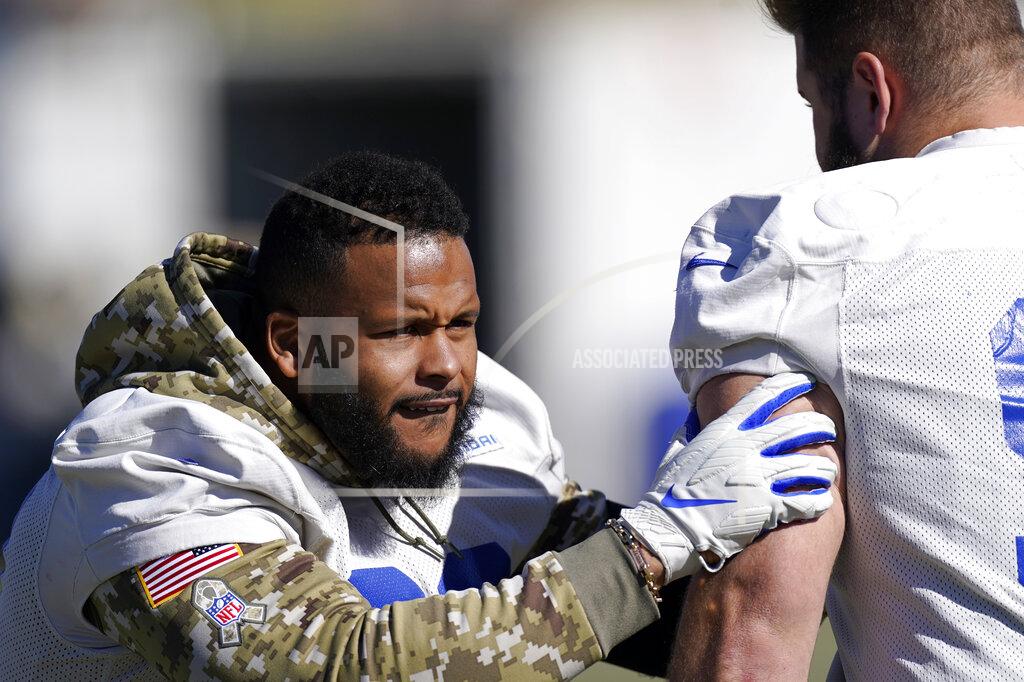 Mark J. Terrill Los Angeles Rams defensive end Aaron Donald, left, works out with nose tackle Greg Gaines during an NFL football practice Friday, Jan. 28, 2022, in Thousand Oaks, Calif., ahead of their NFC championship game against the San Francisco 49ers on Sunday. (AP Photo/Mark J. Terrill)